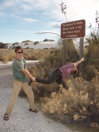 Sign reads: Removal Of Plants, Animals, Sand, or Any Other Natural Object Is Prohibited.